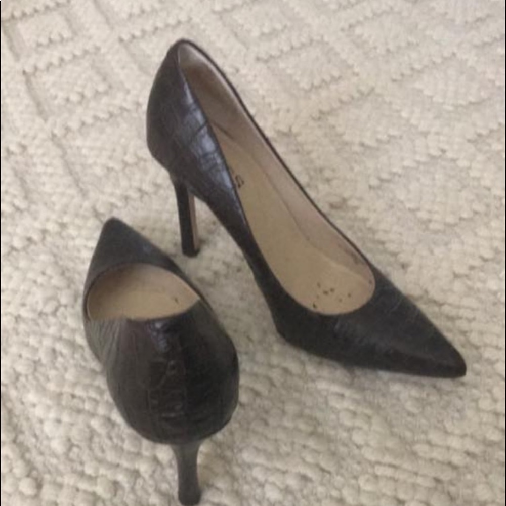 Guess brown high heel shoes.